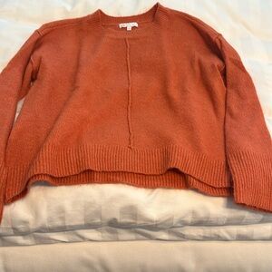 Girls orange sweater